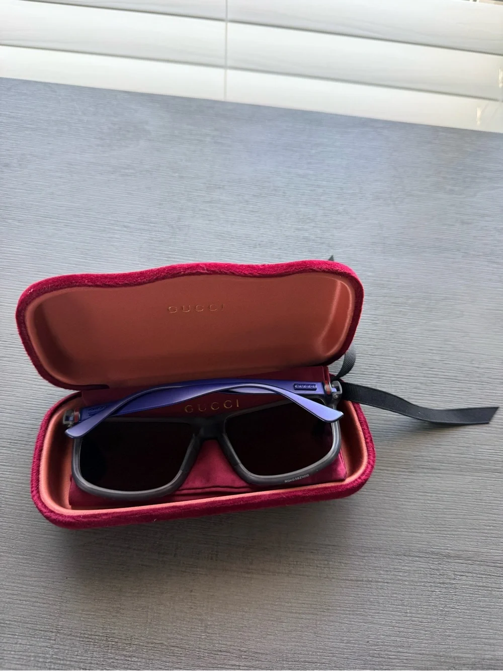 Gucci Black Frame Sunglasses with blue sides and Dark Lenses and Maroon Case